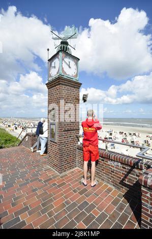 Life guard at the clock tower, Germany, Lower Saxony, East Frisia, Wangerooge Stock Photo