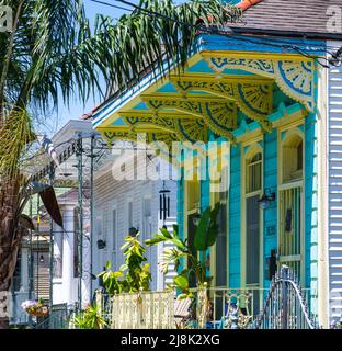 NEW ORLEANS, LA, USA - APRIL 9, 2022: Colorful historic shotgun house in Faubourg St. John neighborhood Stock Photo