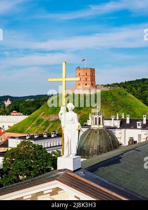 Saint Helena Statue at the Cathedral Basilica of St Stanislaus and St Ladislaus and Gediminas Tower on Castle Hill, Old Town, Vilnius, Lithuania Stock Photo
