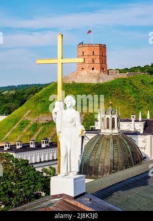 Saint Helena Statue at the Cathedral Basilica of St Stanislaus and St Ladislaus and Gediminas Tower on Castle Hill, Old Town, Vilnius, Lithuania Stock Photo