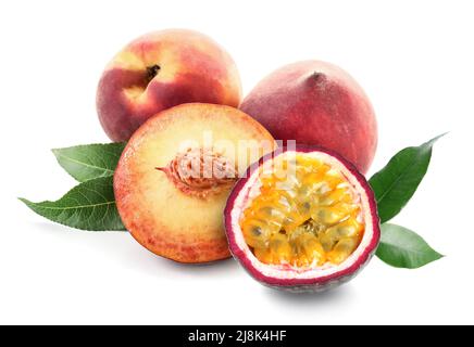 Ripe passion fruit and peach on white background Stock Photo