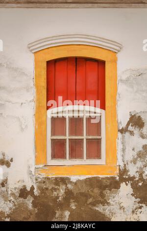 Window of an old building in the city of Paraty, state of Rio de Janeiro, Brazil, founded in 1667. Stock Photo