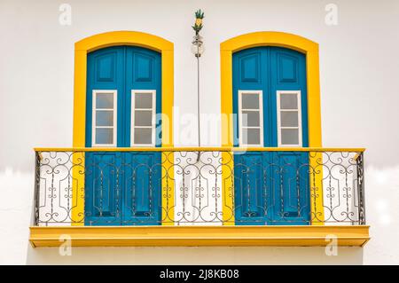 Windows and balcony of an old building in the city of Paraty, state of Rio de Janeiro, Brazil, founded in 1667. Stock Photo