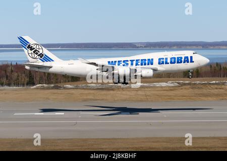 Western Global Airlines Boeing 747 cargo aircraft arriving. Airplane B747 of WGA Cargo airline landing. 747-400 plane. Stock Photo