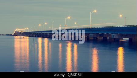 Vintage Film Look Shot of the Tunney Bridge just after sunset with steaks of light from passing cars Stock Photo