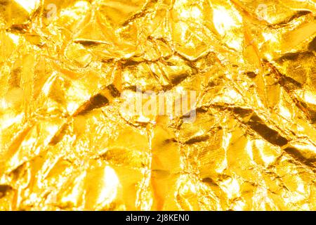background and texture of gold crumpled paper Stock Photo