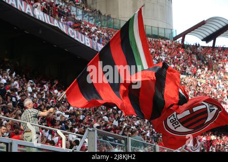 Milan Fans AC Milan fans wave flags and hold up scarves during the Serie A match ...