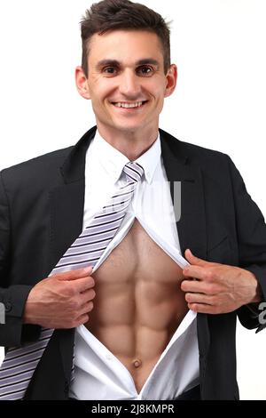 Handsome fit man with six-pack abs in trendy working suit, brag about perfect body image Stock Photo