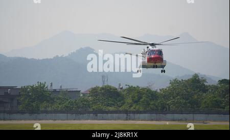 (220517) -- JINGDEZHEN, May 17, 2022 (Xinhua) -- An AC313A large utility civil helicopter hovers at an airport in Jingdezhen, east China's Jiangxi Province, May 17, 2022. China's independently-developed AC313A large utility civil helicopter successfully conducted its maiden flight on Tuesday, announced the Aviation Industry Corporation of China (AVIC), the country's leading aircraft maker. The 13-tonne-class large helicopter made its maiden flight at an airport in Jingdezhen, east China's Jiangxi Province, marking a major step forward in the development of China's air emergency rescue syste Stock Photo