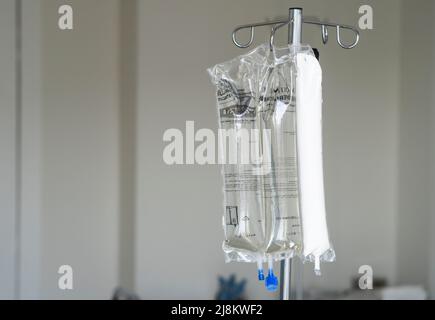 Close up of Total Parenteral Nutrition for feeding person intravenously, bypassing usual process of eating. Still closed. Stock Photo