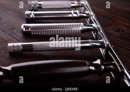 Set of razors on wooden background Stock Photo