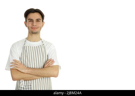 Concept of cooking, young man chef isolated on white background Stock Photo