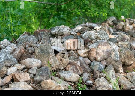 Selective focus shot of wall-shaped stones. Stock Photo