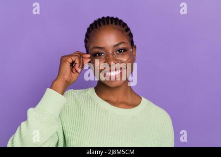 Portrait of pretty cheerful young business lady wear spectacles work marketing isolated on violet color background Stock Photo