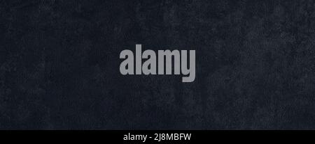 Textured dark gray wall wide panoramic texture. Grunge grey plaster large long surface. Abstract widescreen background Stock Photo