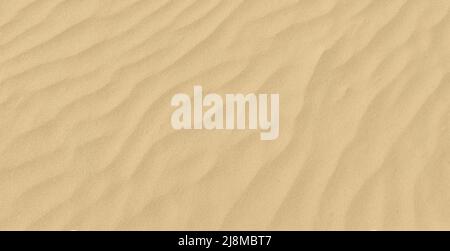 Sand texture. Sandy beach for background. Top view. Natural sand stone texture background. sand on the beach as background. Stock Photo