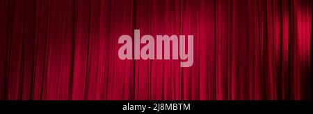 Background image of a red velvet stage curtain Stock Photo