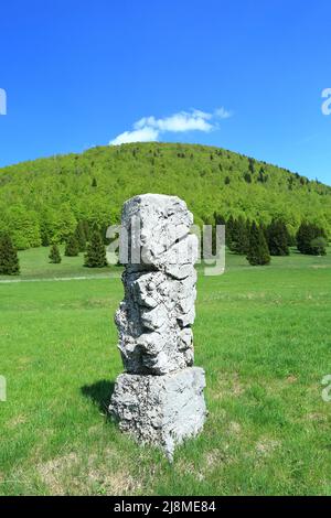 Stone monoliths in memory of frozen soldiers in world war II, Matic poljana, Gorski kotar area, Croatia Stock Photo
