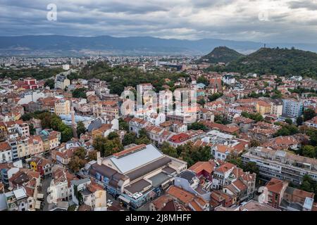 Old Town of Plovdiv city, capital of Plovdiv Province in south-central Bulgaria, view with hills called Danov, Youth and Liberators, drone photo Stock Photo