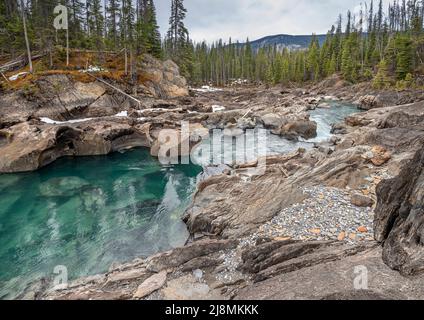 Kicking Horse River with Eroded Rocks near the town of Field Stock Photo