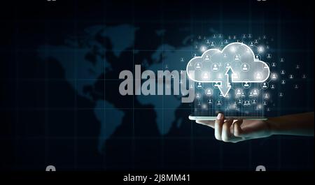Businessman with Cloud computing technology internet storage network and smartphone. Connect mobile devices to cloud. Cloud technology, Cloud storage. Stock Photo