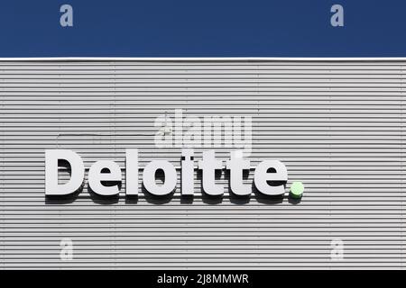 Aalborg, Denmark - July 13, 2017: Deloitte is one of the Big Four accounting firms and the largest professional services network in the world Stock Photo