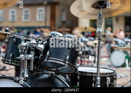 A set of plates in a drum set. At a concert of percussion music, selective focus, close-up Stock Photo