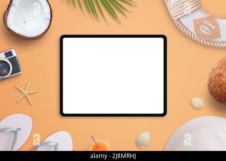 Tablet mockup on beach concept. Isolated screen for design promotion. Top view, flat lay composition with traveler accessories Stock Photo