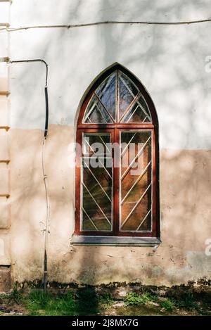 Vintage window in amazing old building Stock Photo