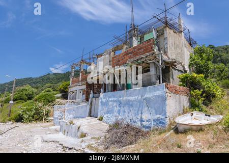 Ruined building in Agios Gordios town on a Greek Island of Corfu Stock Photo