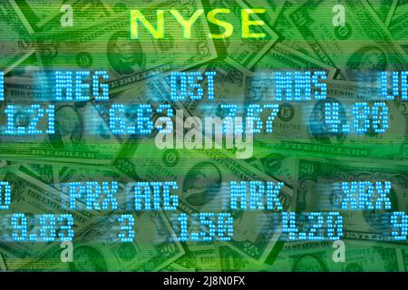 New York Stock Exchange stock trading board listings moving across US dollar bills. Investing in the financial market. Stock market prices. USA Stock Photo