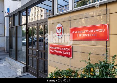 Signboard on a governmental building of Ministry of Economic Development and Technology and Ministry of Family and Social Policy in Warsaw, Poland Stock Photo