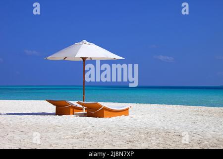 Parasol and sun chairs at the beach, Conrad Maldives, Rangali Island, South-Ari Atoll, Maldives, Indian ocean Stock Photo