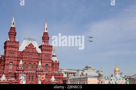 Moscow, Russia, May 2022: The flight in the sky of three IL-76MD heavy long-range military aircrafts in a blue sky. The main rehearsal of military par Stock Photo