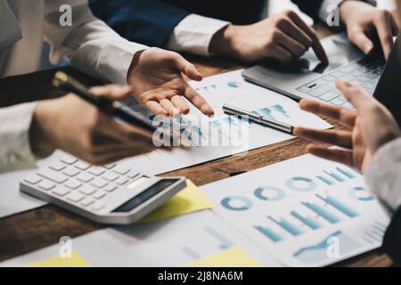 In an open space, a business team or accountant collaborates on an audit transection budget of company. Stock Photo