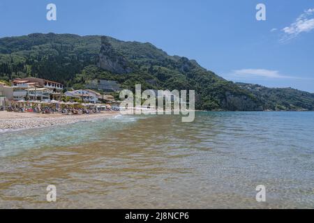 Ionian Sea beach in Agios Gordios town on a Greek Island of Corfu Stock Photo