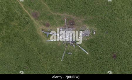 Kharkiv, Ukraine. 17th May, 2022. Drone shot of an Mi-28 helicopter, downed in early March, in a field east of Kharkiv in Biskvitne, Ukraine, Monday, May 16, 2022. Ukrainian forces said Monday their counteroffensive in the second-largest city of Kharkiv has allowed them to push back Russian forces in one of the most significant setbacks for Moscow since the start of its invasion. Photo by Ken Cedeno/UPI Credit: UPI/Alamy Live News Stock Photo