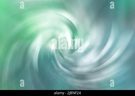 Summer green and blue spiral vortex soft blurred abstract gradient background Stock Photo
