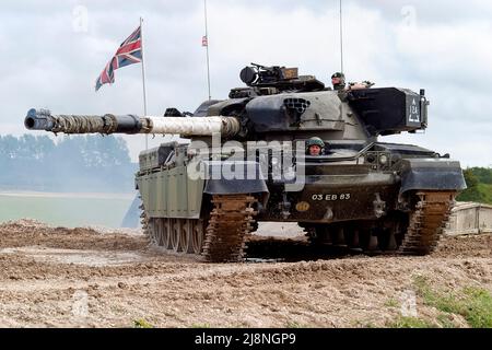 Bovington, Dorset / UK - August 17 2004: An ex British Army Mk 2 FV4201 Chieftain Main Battle Tank '03 EB 83' at the Bovington Tank Museum Stock Photo