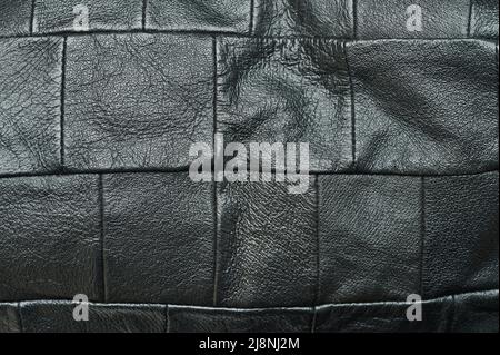 Black soft leather square patches close up view Stock Photo