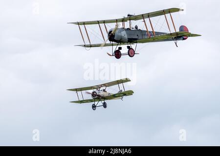 1916 Sopwith Pup ‘G-EBKY’ & 1918 Avro 504K ‘E3273’ airborne at Shuttleworth Season Premiere airshow on the 1st May 2022 Stock Photo