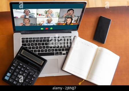 Laptop screen webcam view different ethnicity and age people engaged in group videocall. Video conference. Modern technology, easy convenient on-line Stock Photo