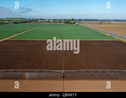 Aerial top view of a different agriculture fields. Drone shot. Stock Photo