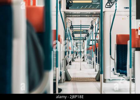 Modern empty passenger train carriage, interior. City tramsportation. Transport, tourism, travel road trip Stock Photo