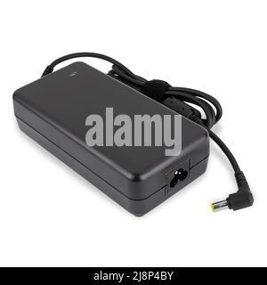 power adapter for a laptop, an accessory for a laptop, a spare for a computer, on a white background Stock Photo