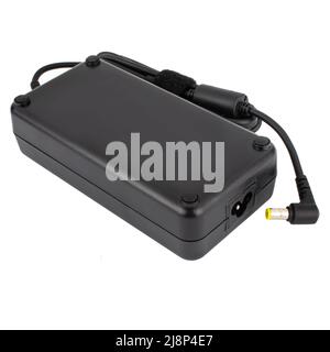 power adapter for a laptop, an accessory for a laptop, a spare for a computer, on a white background Stock Photo