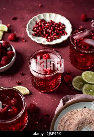 Margarita Bar with Pink Salt, Pom Seeds and Raspberries Stock Photo