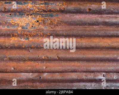 Old rusty corrugated steel sheet background Stock Photo