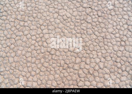 Dry cracked lake bed background in the desert Stock Photo