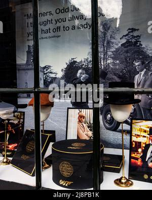 The frontage of Lock & Co. Hatters, world's oldest hat shop, at 6 St James's St, London; a special (Sean Connery ) James Bond window. Stock Photo